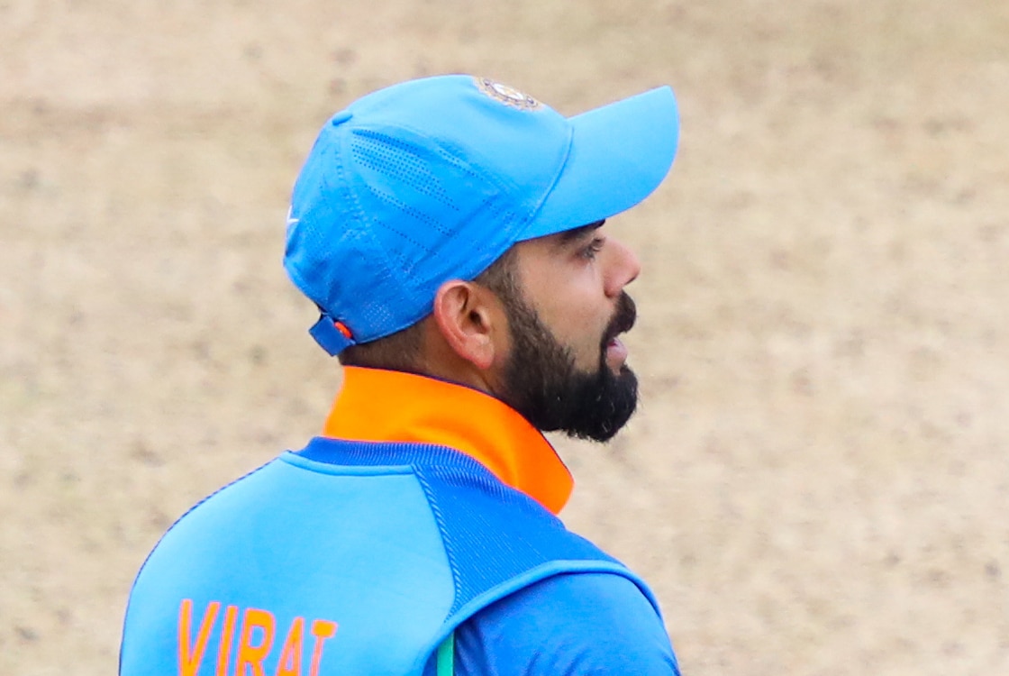 Virat Kohli playing for India